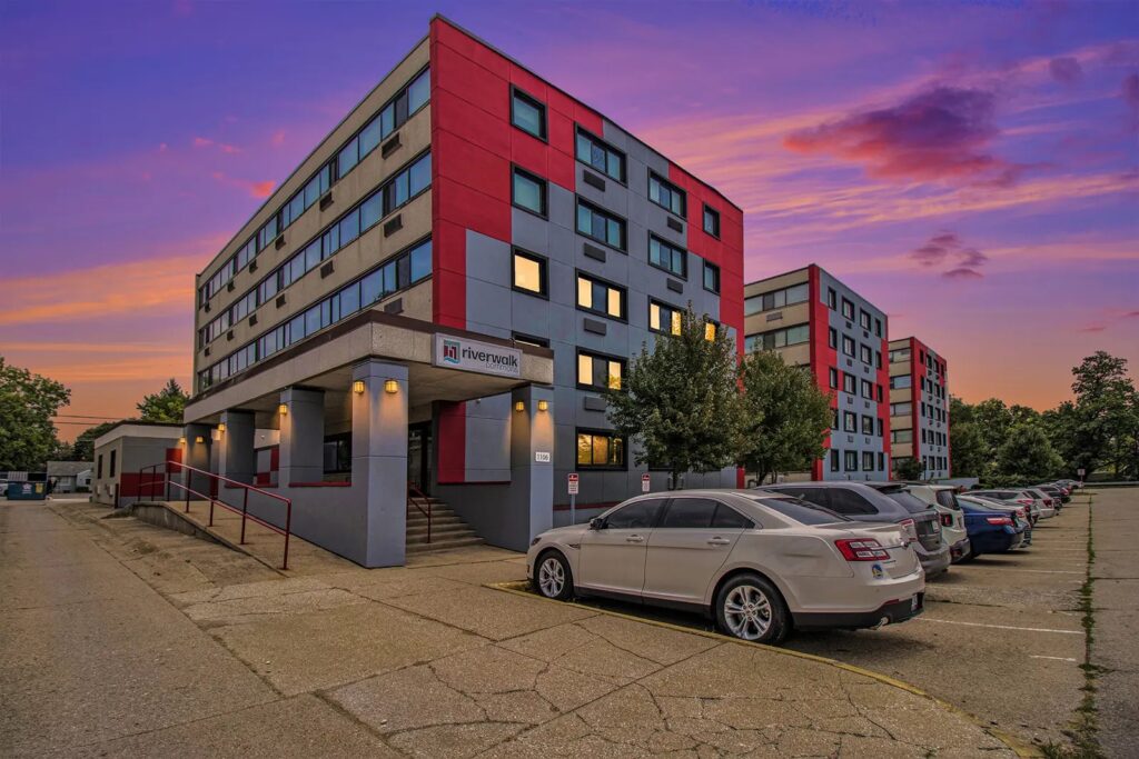 a sunset shot of Riverwalk Commons student apartments